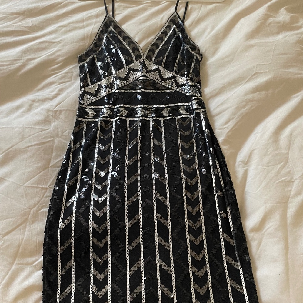 Strapping, black and silver sequins dress